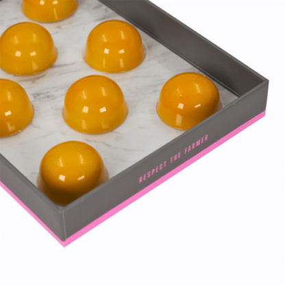 Passion fruit and mango bonbon box of 8 from the side
