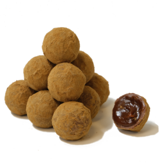 A truffle made of milk chocolate filled with a salty licorice caramel with ammonium chloride salt and muscovado sugar, finally rolled in licorice powder.